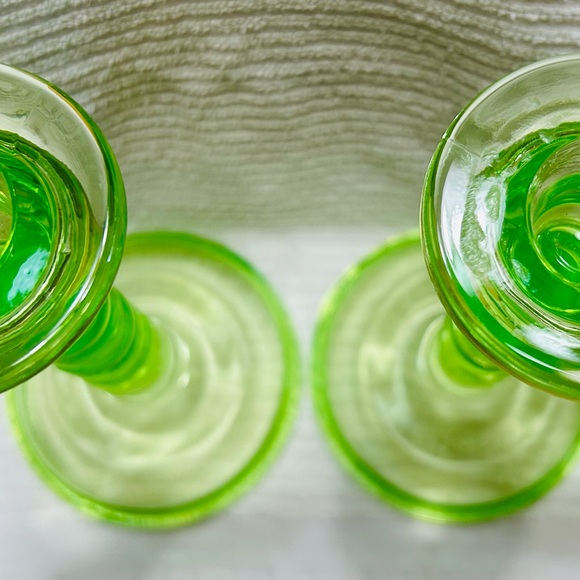 Antique vasoline glass candle stick holders, 8” tall by 4.25” wide at base. - Picture 2 of 5